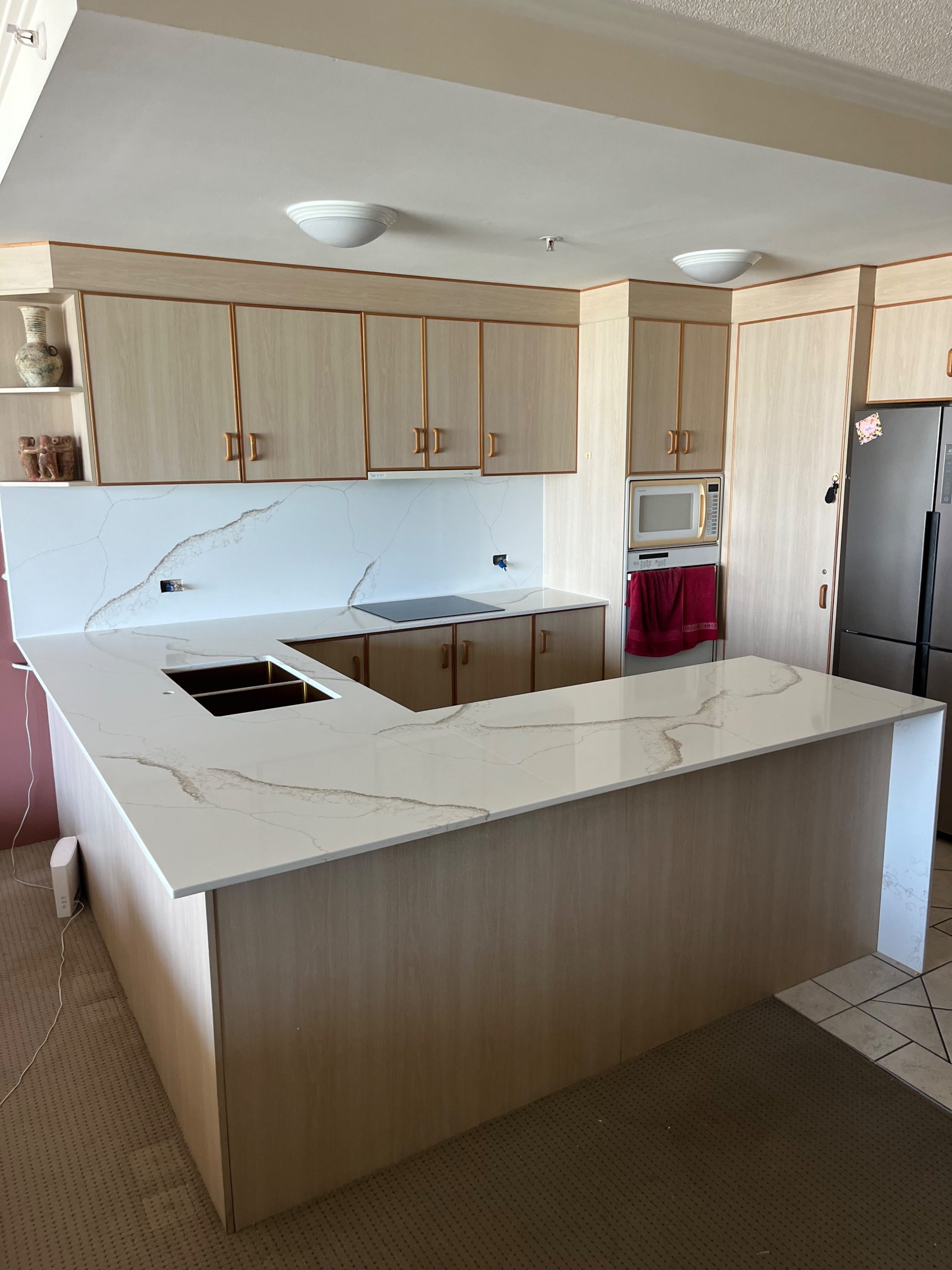 Completed new build kitchen with new stone benchtop